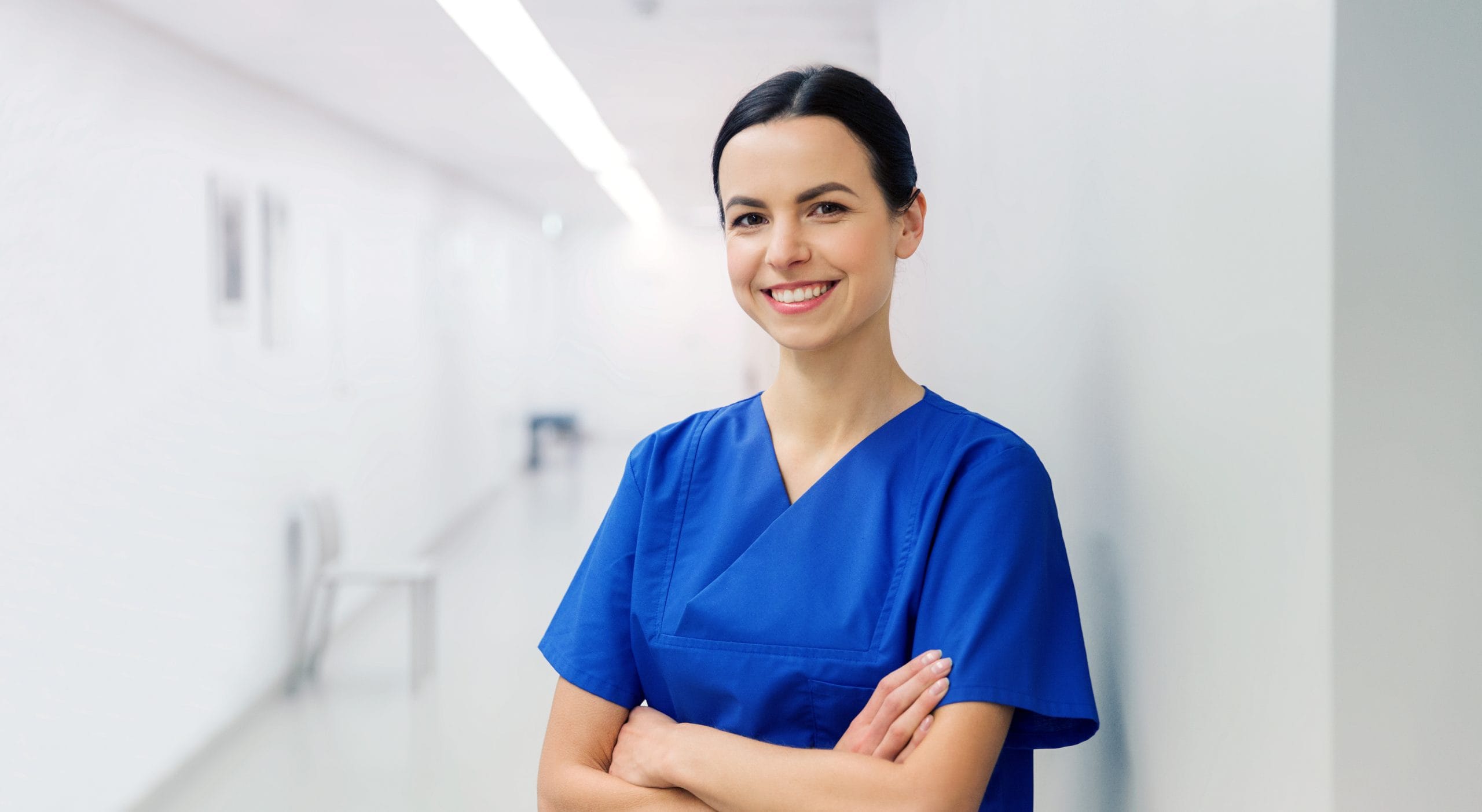 Dental Nurse at dental hospital corridor